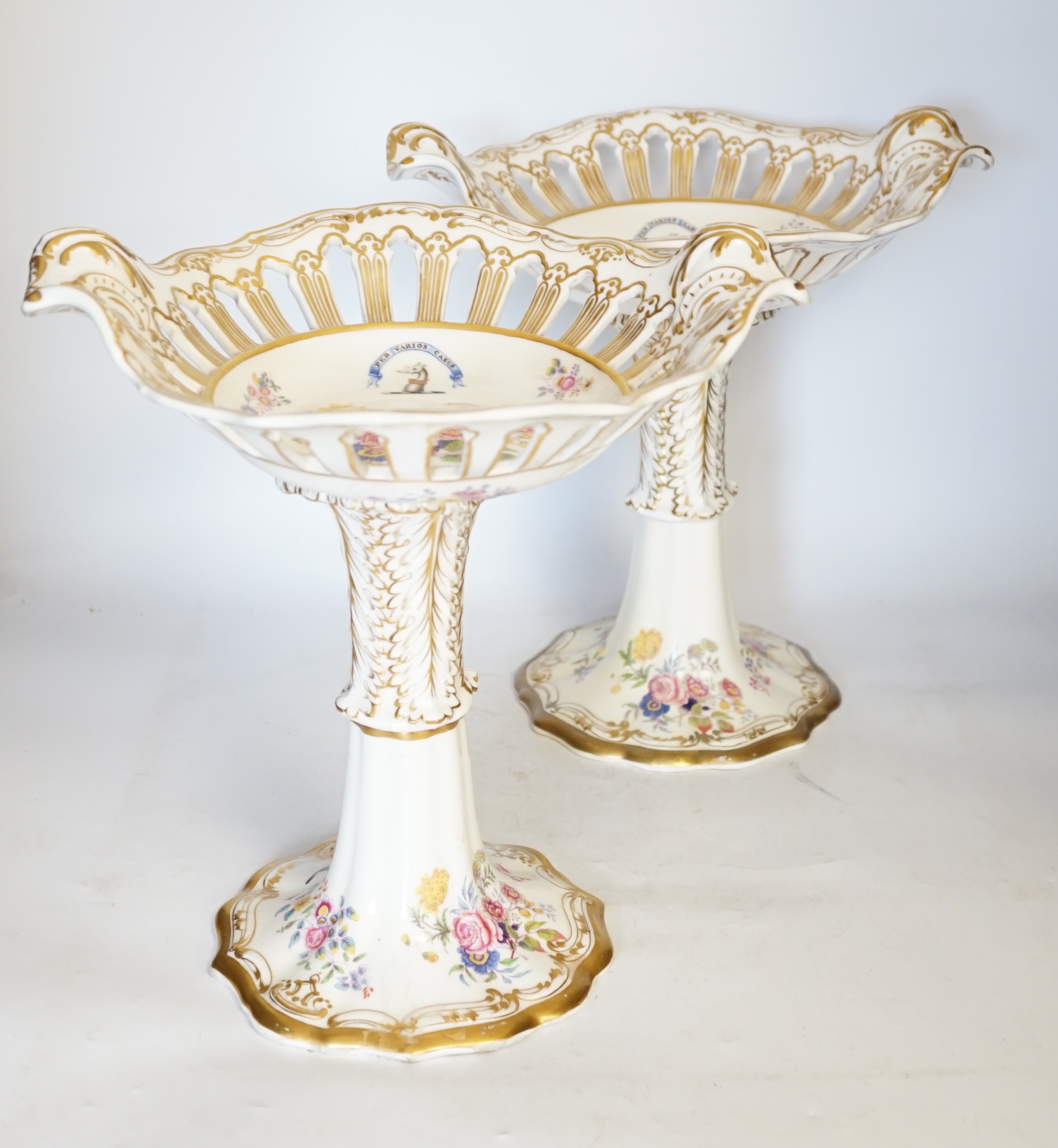 A pair of Copeland & Garrett porcelain crested comports in two parts, c.1840, 33cm. Condition - poor to fair